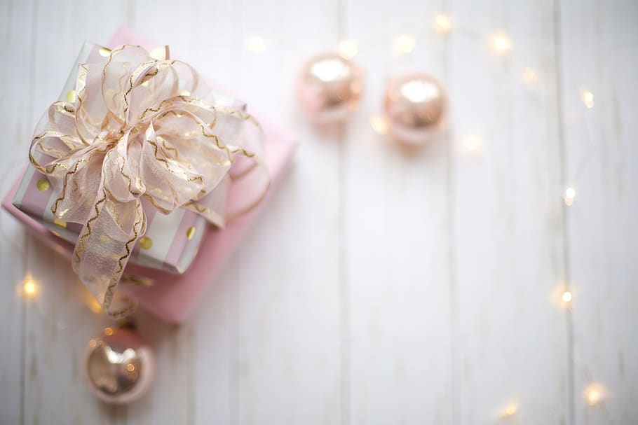 Pink Christmas Photos, jewelry, selective focus, elegance, human hand Free HD Wallpaper
