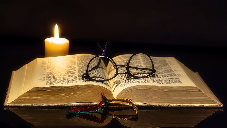 Bible Stained Glass Window, visual acuity, candlelight, eye glasses, book pages Free HD Wallpaper