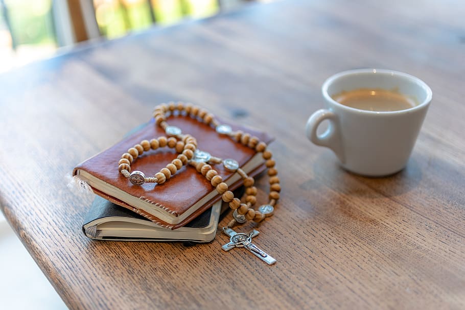 Catholic Child Baptism, crockery, cross, church, focus on foreground