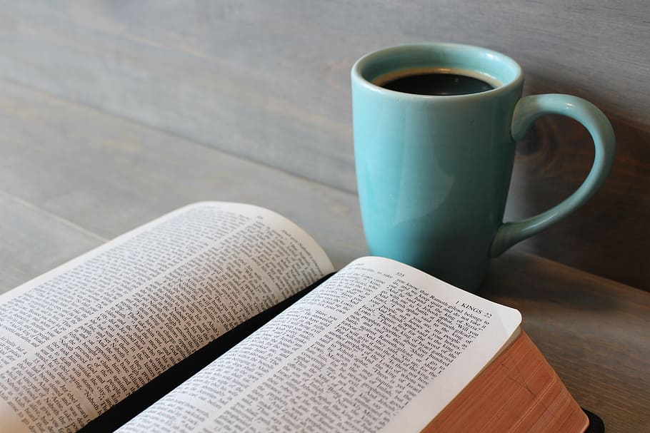 Coffee Cup and Bible, coffee cup, no people, newspaper, still life