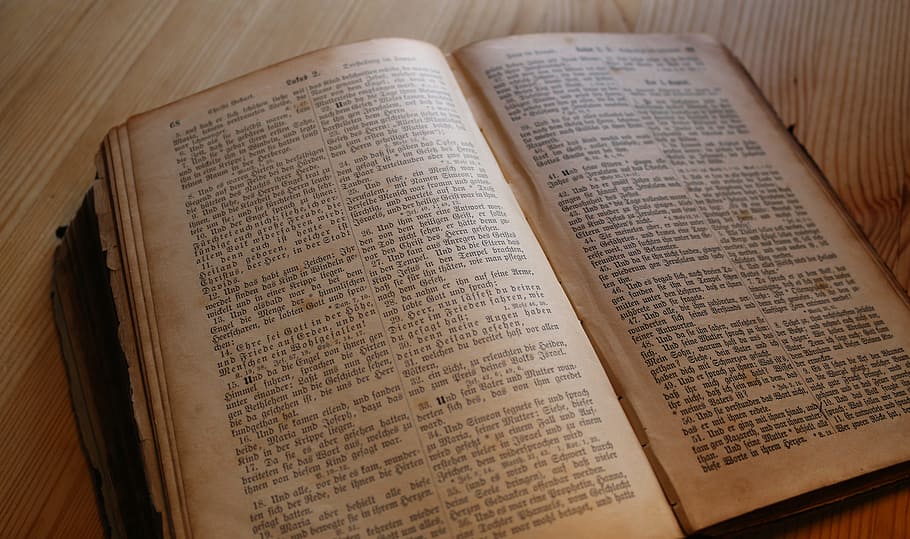 Holy Bible New Testament, text, indoors, reading, history Free HD Wallpaper
