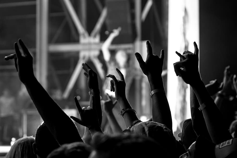 Rock Hand Sign Meaning, excitement, tree, cheering, arms raised