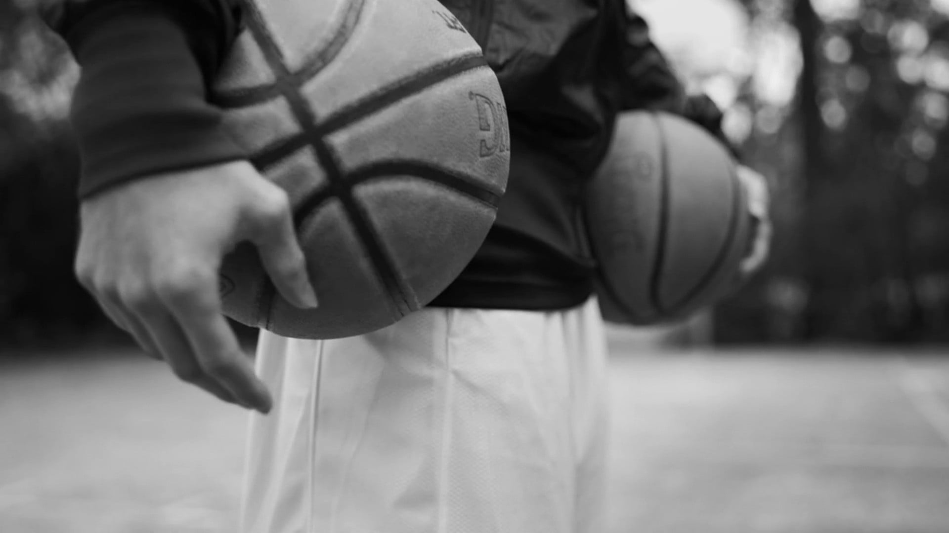 Basketball Hoop Black and White, focus on foreground, front view, closeup, clothing