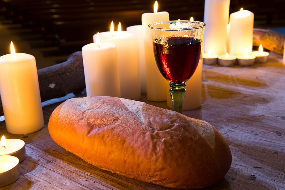 Unleavened Communion Bread and Wine, still life, drinking glass, flame, food