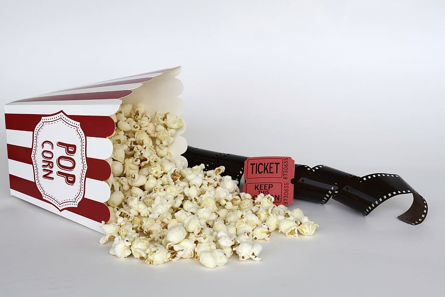 Movie with Popcorn, show, container, white background, no people