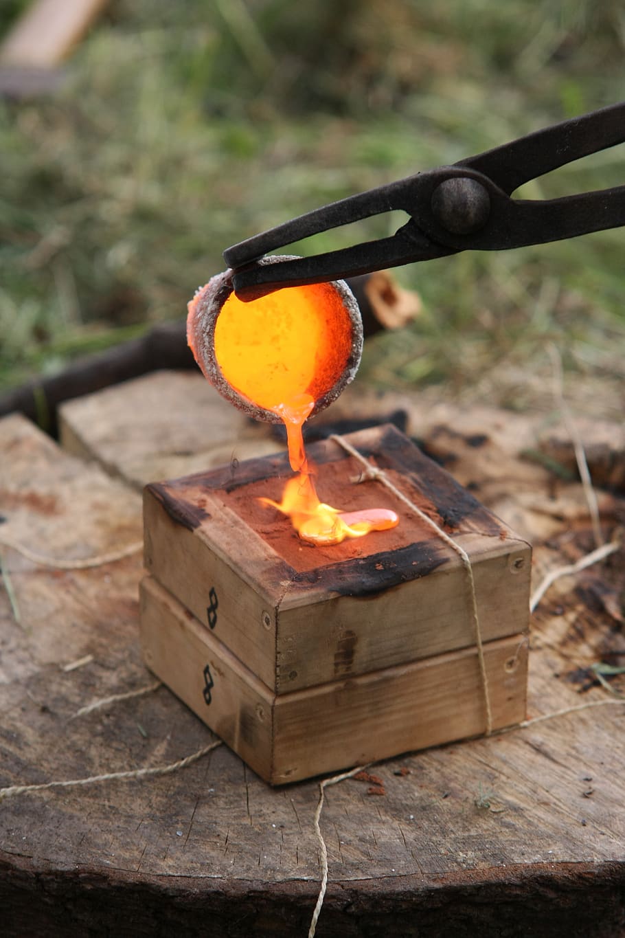 Bronze Earrings, liquid metal, nature, bronze casters, glowing