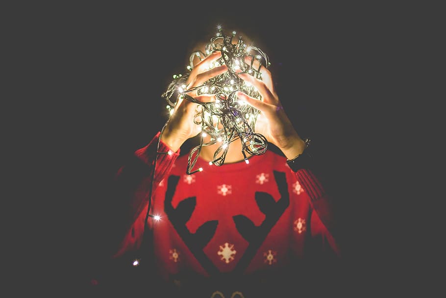 Christmas Sweaters, christmas lights, room for text, copy space, studio shot Free HD Wallpaper