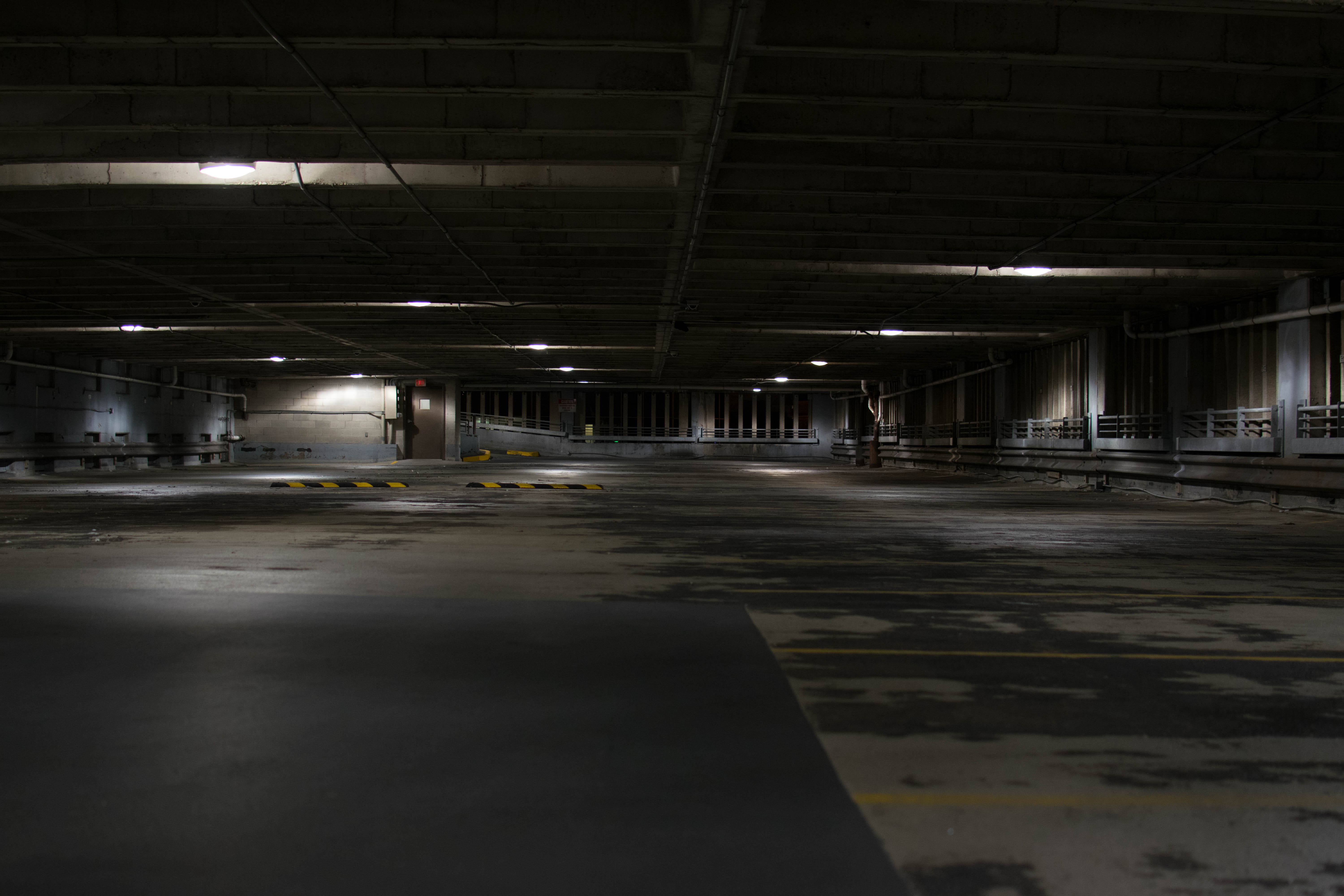 parking lot, indoors, night, dirty