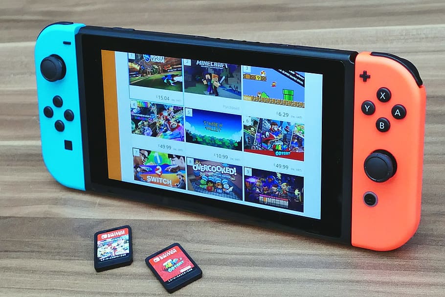 All Games the Nintendo Switch, indoors, closeup, console, playing