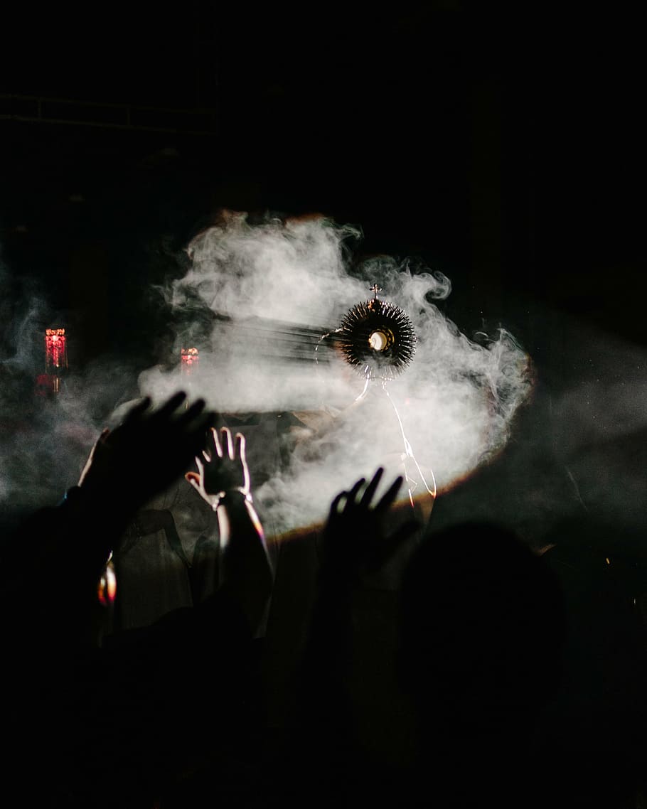 black background, motion, indoors, celebration