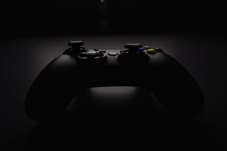 PlayStation Controller, two objects, closeup, spotlight, xbox Free HD Wallpaper