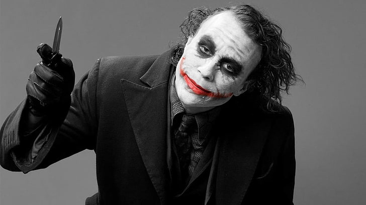 Joker Dark Knight Movie, studio shot, one person, wall  building feature, suit