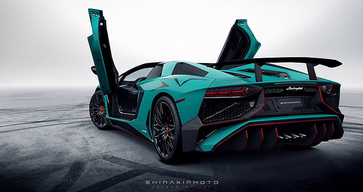 New Lamborghini V12, day, text, mode of transportation, closeup