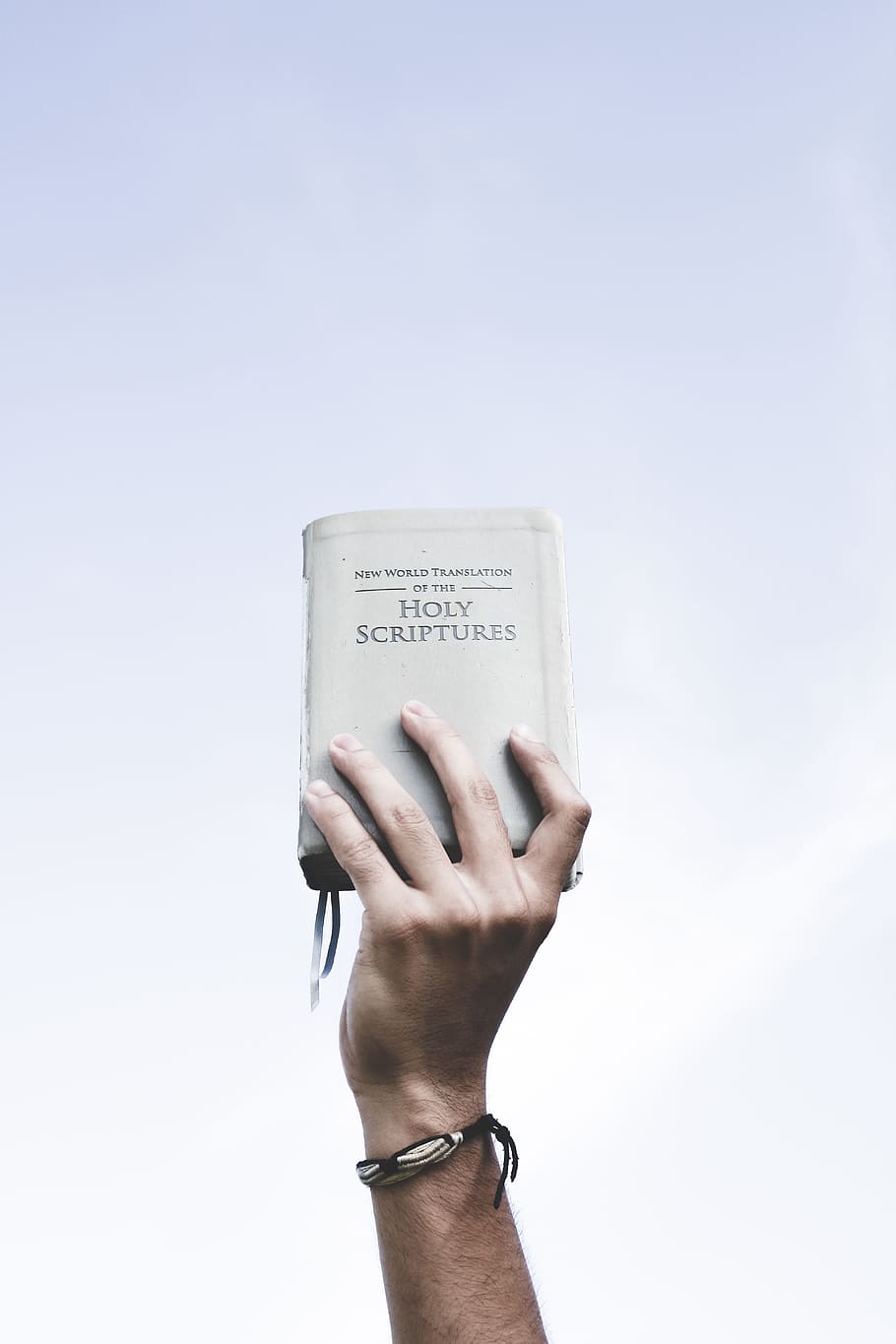 Black Hands Holding Bible, religion, human arm, one person, body part Free HD Wallpaper