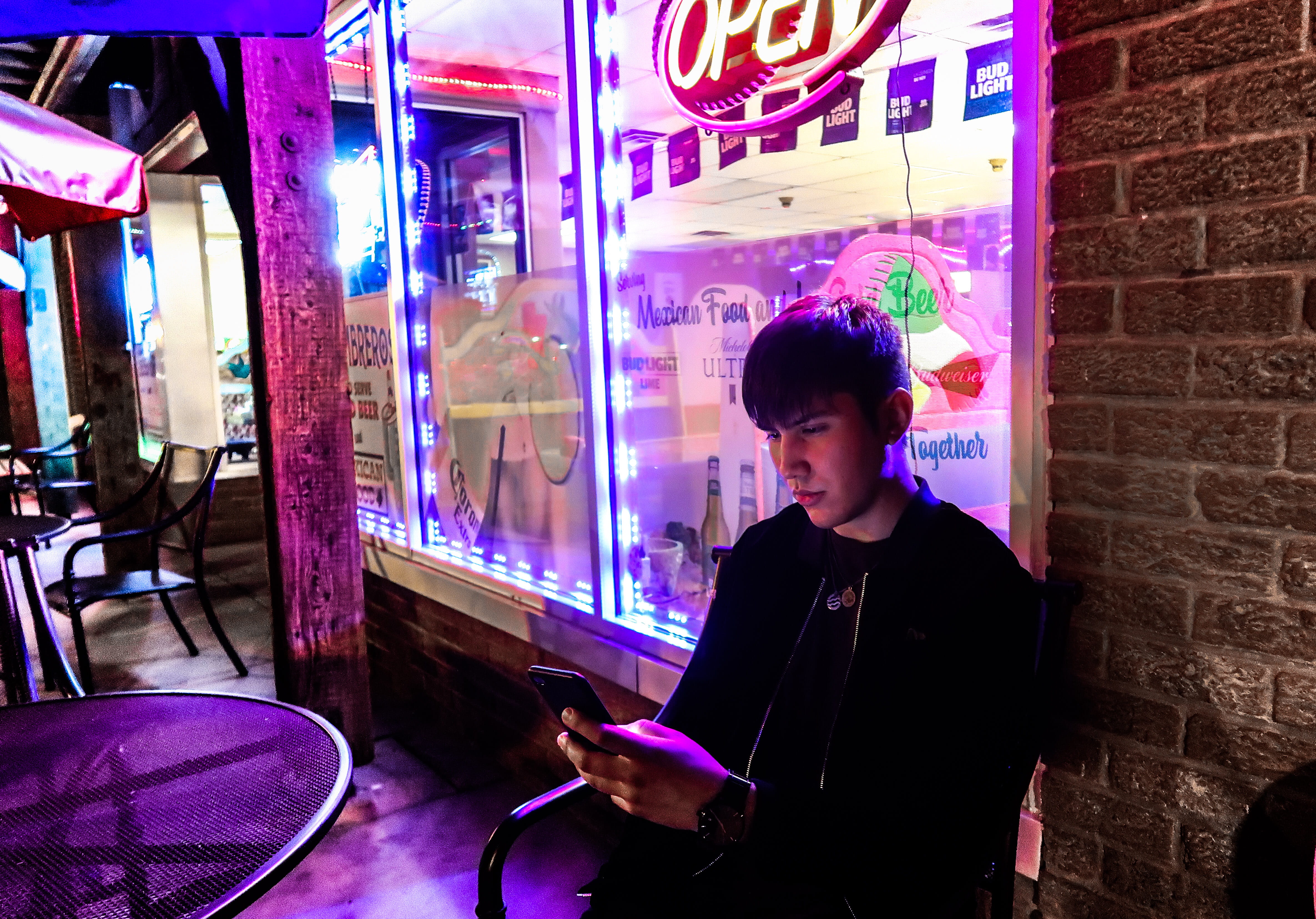 Stranger Things Logo, nightlife, indoors, waist up, teenager