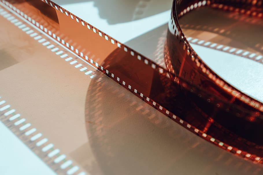 Film Industry Icon, roll, selective focus, arts culture and entertainment, studio shot Free HD Wallpaper