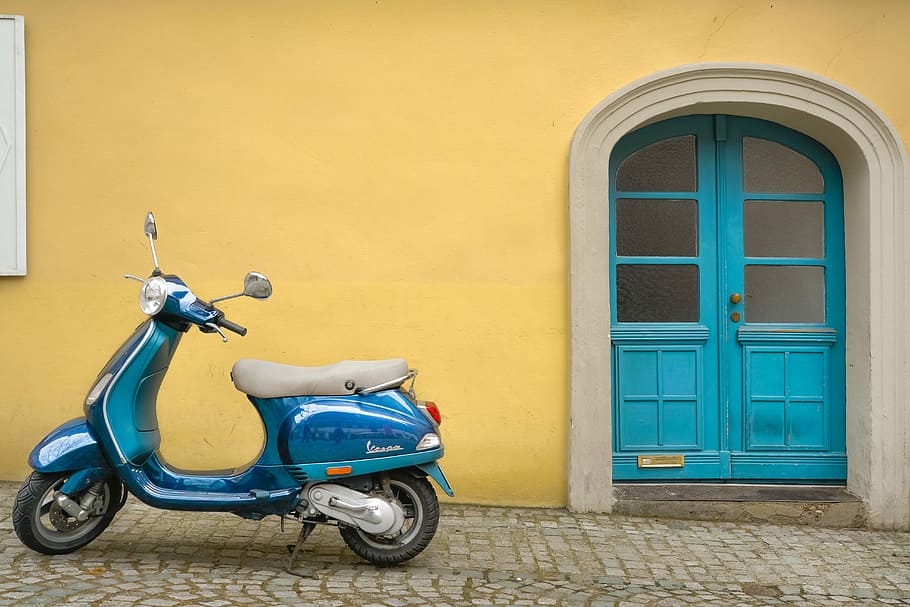 wheel, yellow stucco, mode of transportation, wall  building feature Free HD Wallpaper