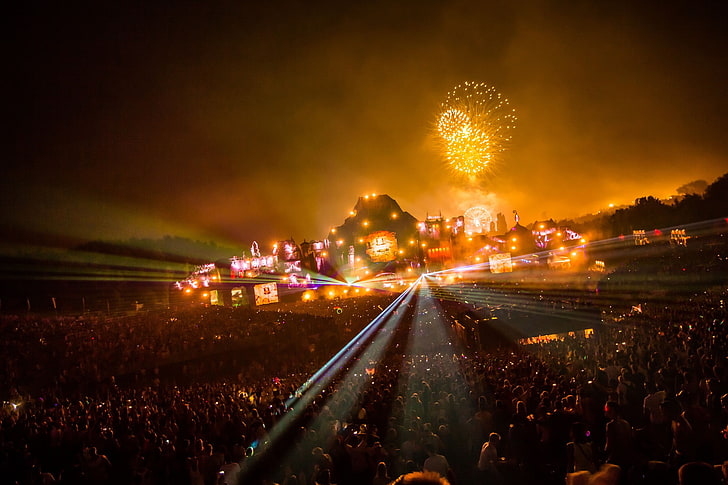 Orange Alian Croud, glowing, built structure, firework, light