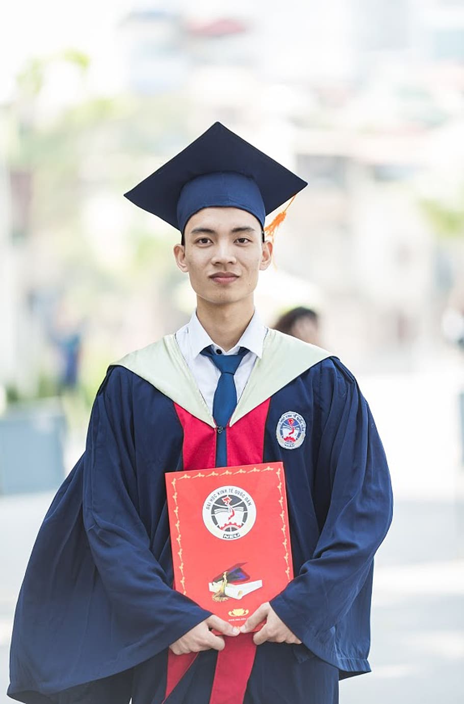 Colleges and Universities Near Me, young adult, smiling, one person, looking at camera