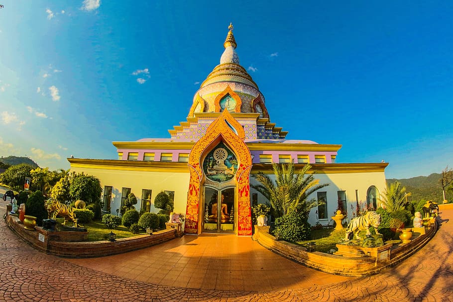 Dream Beach House, spire, statues, buddha, structure