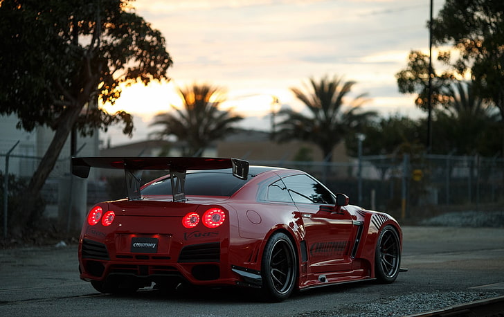 Nissan GT-R R36, focus on foreground, city, no people, sky